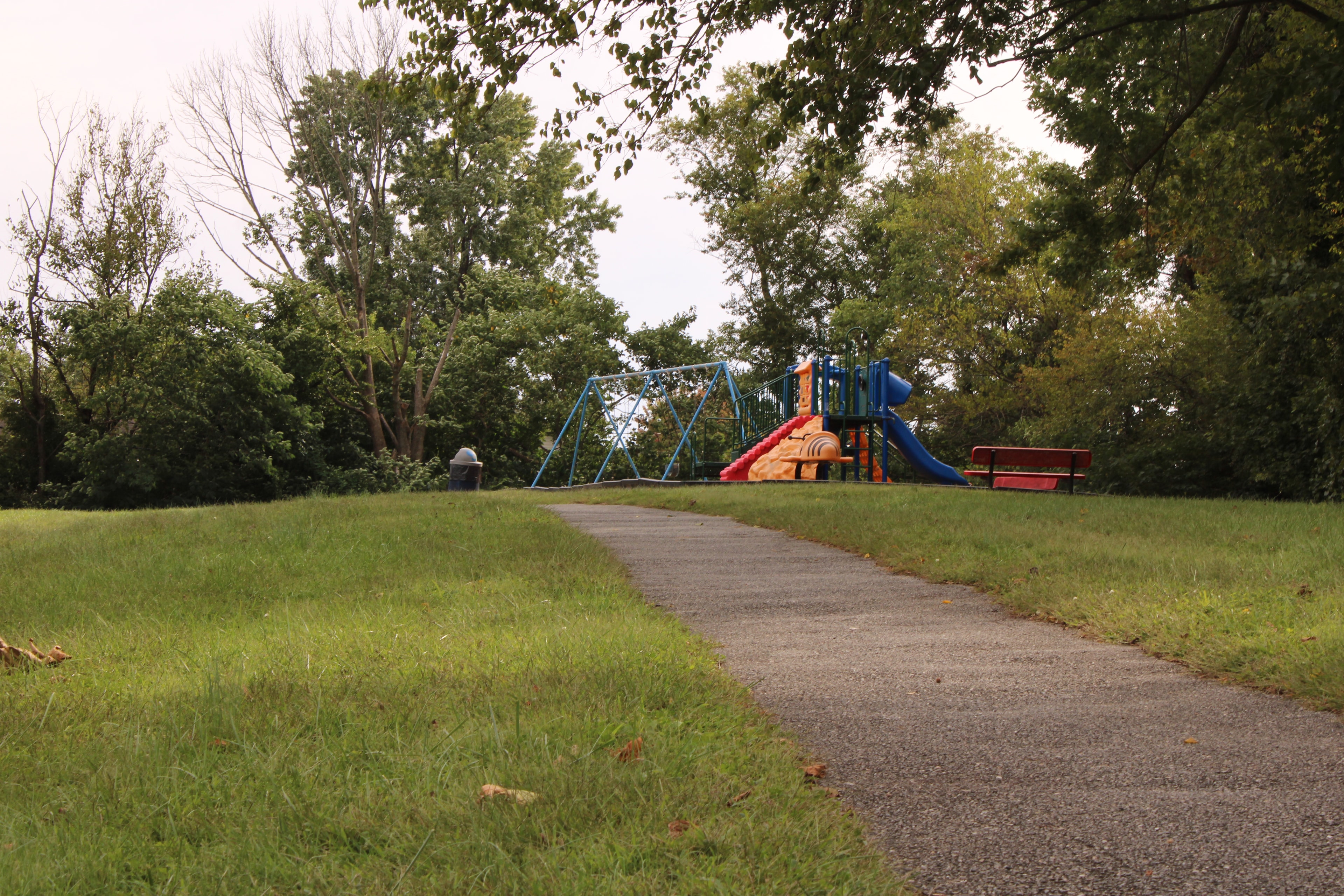 Paved path leading to the Brookside playground